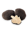 Fresh Summer Truffle Tuber Aestivum with black truffles and marbled interior