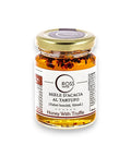 Jar of acacia honey with white truffles for a gourmet culinary experience