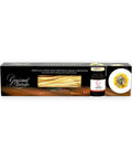 Gourmet truffle pasta box with black and gold accents featuring long spaghetti noodles, Salsa Tartufata pack